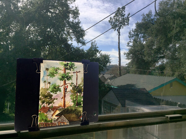 View of tree trimmer from my studio window